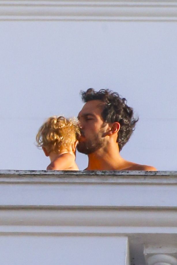 

Joaquim Valente took on daddy duty as he stayed behind with his and Gisele Bündchen's young son at the Copacabana Hotel while the supermodel headed to work