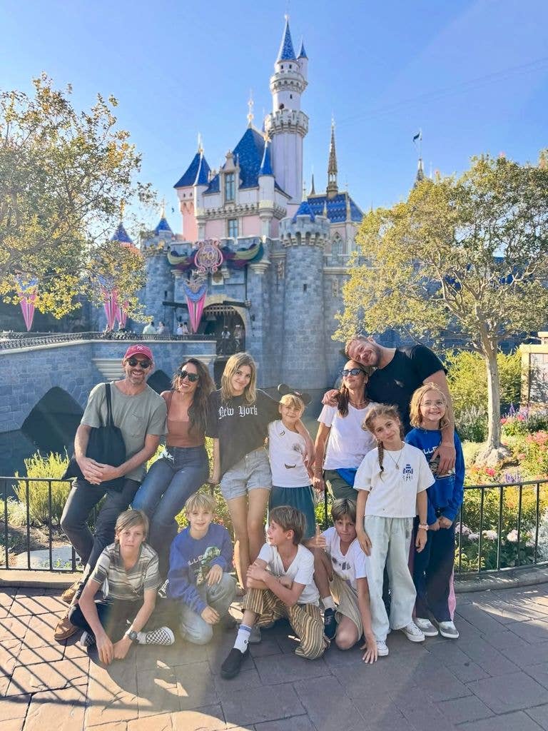 Minka Kelly and Dan Reynolds posing together at Disneyland, shared via Instagram