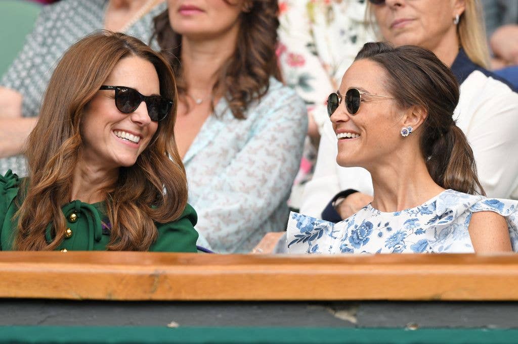 A close up photo of Kate and Pippa Middleton at Wimbledon