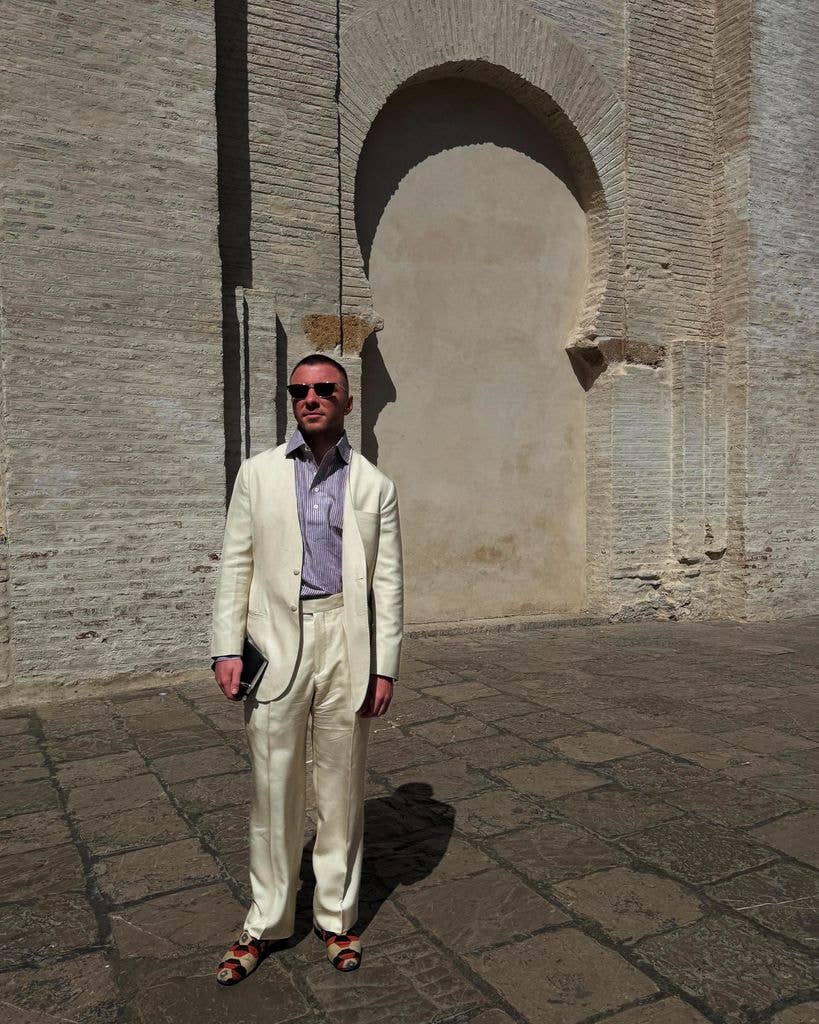 Rocco wearing cream suit