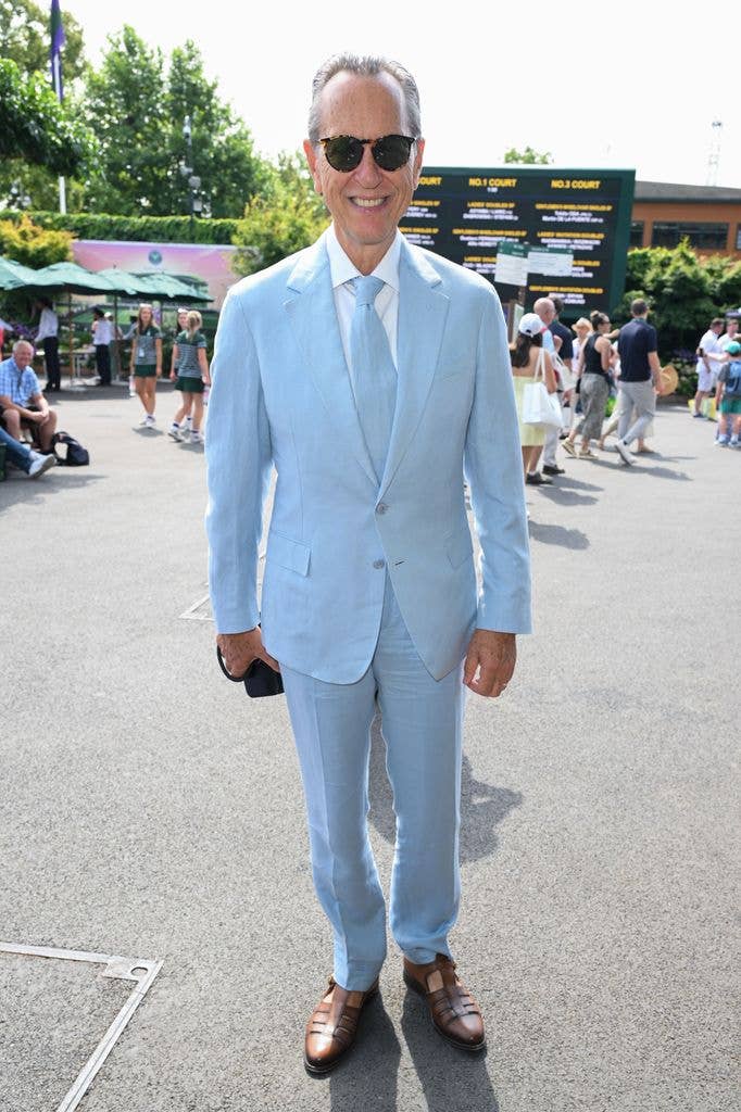 Richard Grant in a blue suit at Wimbledon