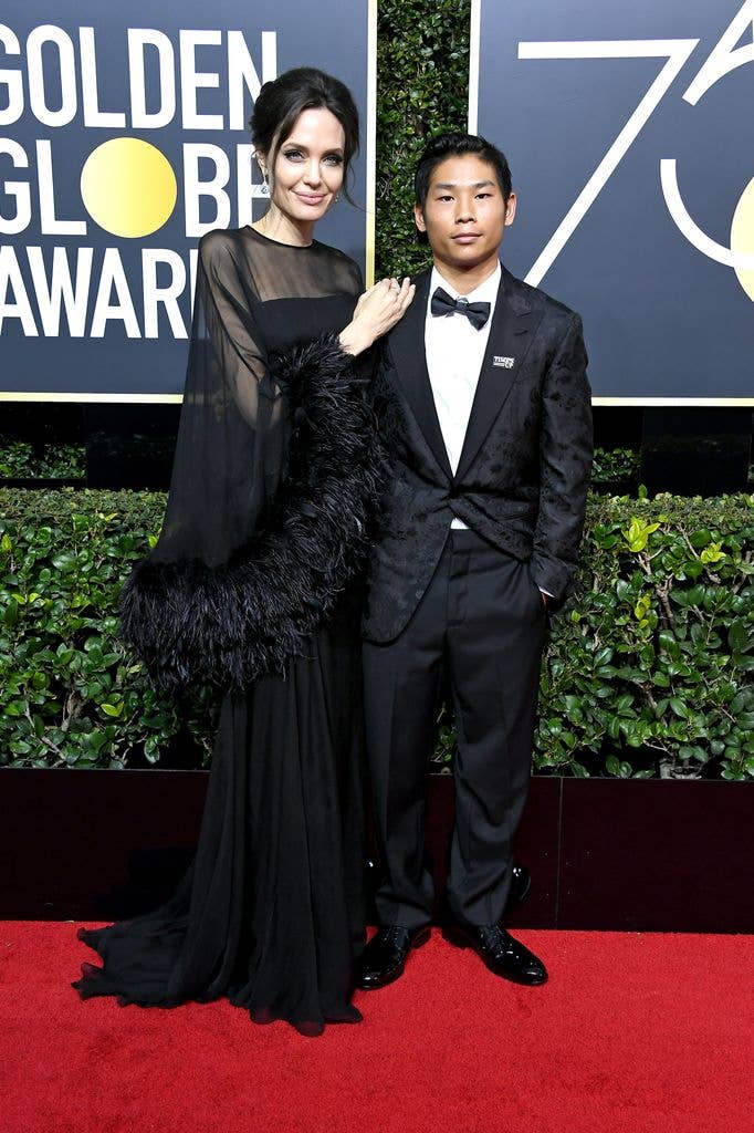 Angelina Jolie and Pax Jolie-Pitt attend The 75th Annual Golden Globe Awards