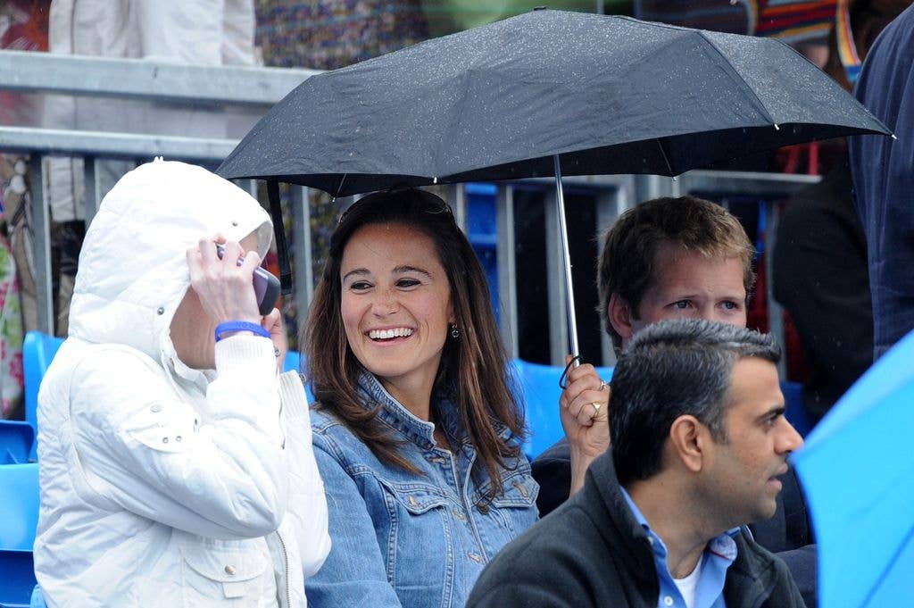 A photo of Pippa Middleton holding an umbrella