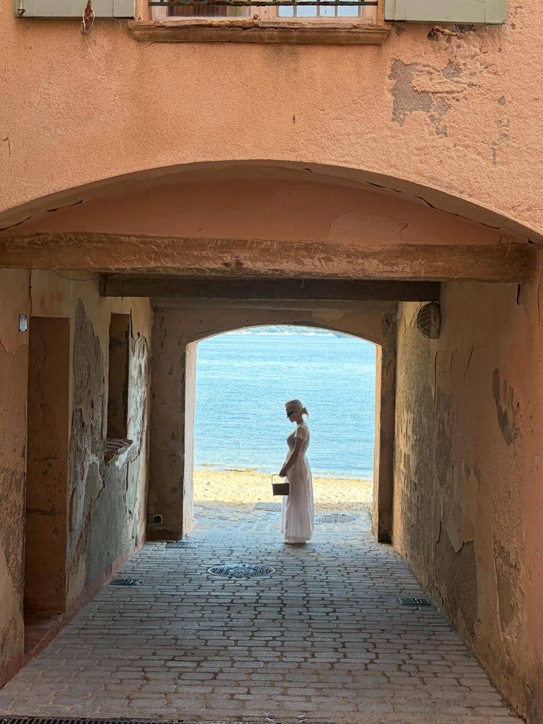 Pamela Anderson captured exploring the streets of Saint-Tropez, shared on Instagram