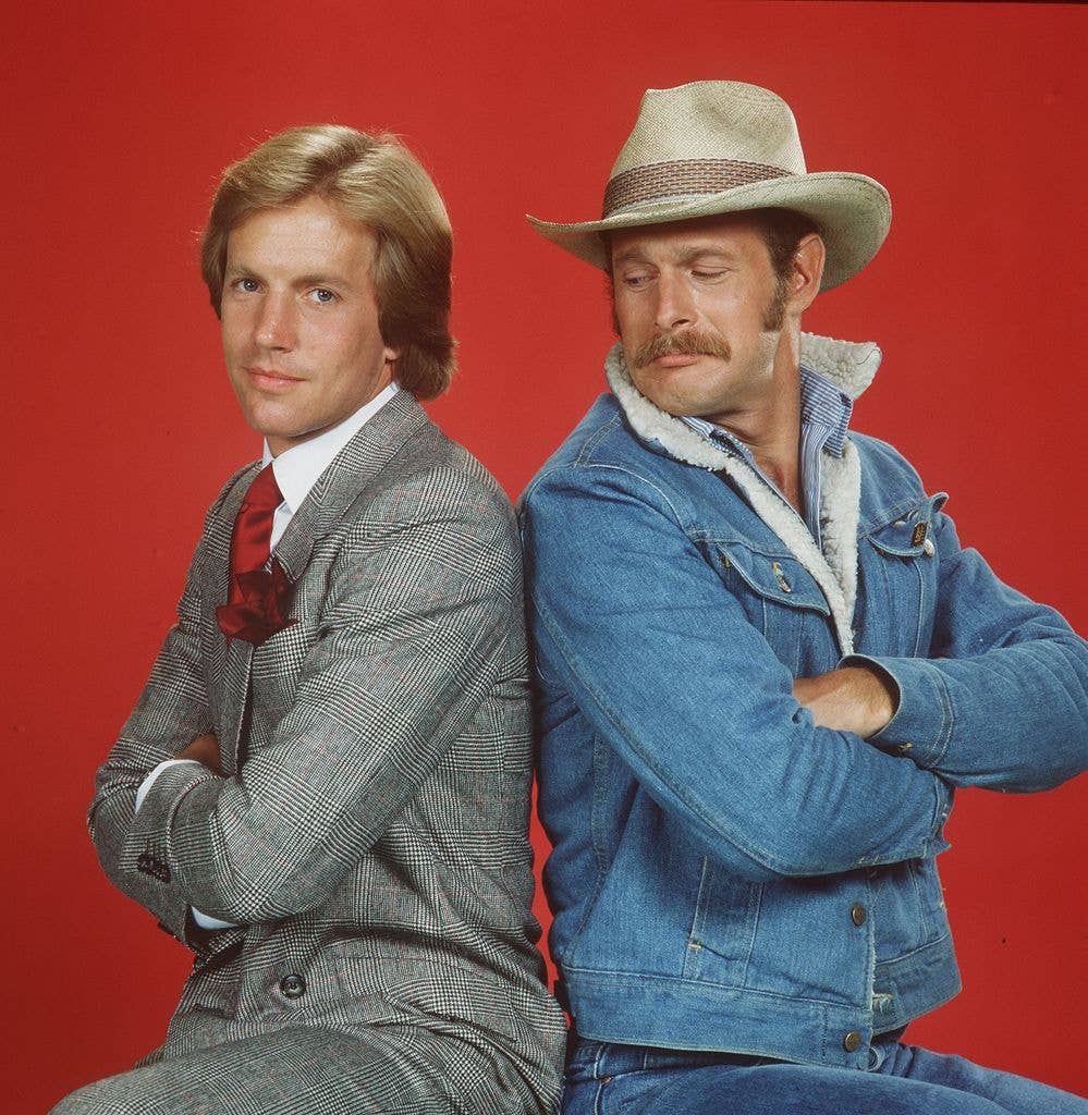 SIMON & SIMON cast members Jameson Parker (left, as A.J. Simon) and Gerald McRaney (as Rick Simon)