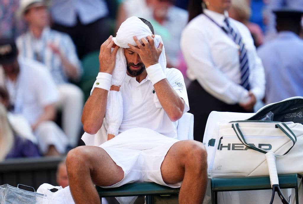 Novak Djokovic in-between games during his Gentlemen's Singles semi-final match against Jannik Sinner