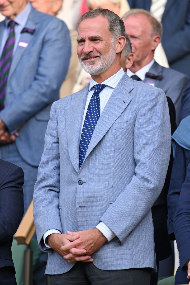 At Wimbledon, the Spanish king’s carefully balanced suit, shirt collar, and tie knot drew attention from menswear experts.