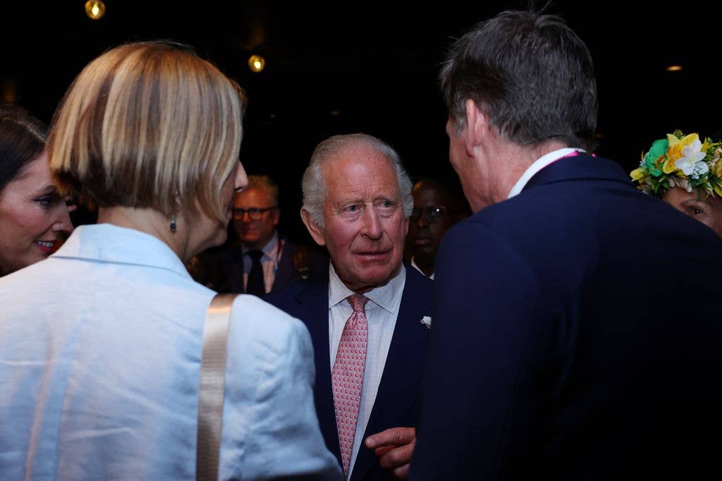 King Charles III interacts with guests during a Royal Reception ahead of the opening ceremony ahead of the Glasgow 2026 Commonwealth Games