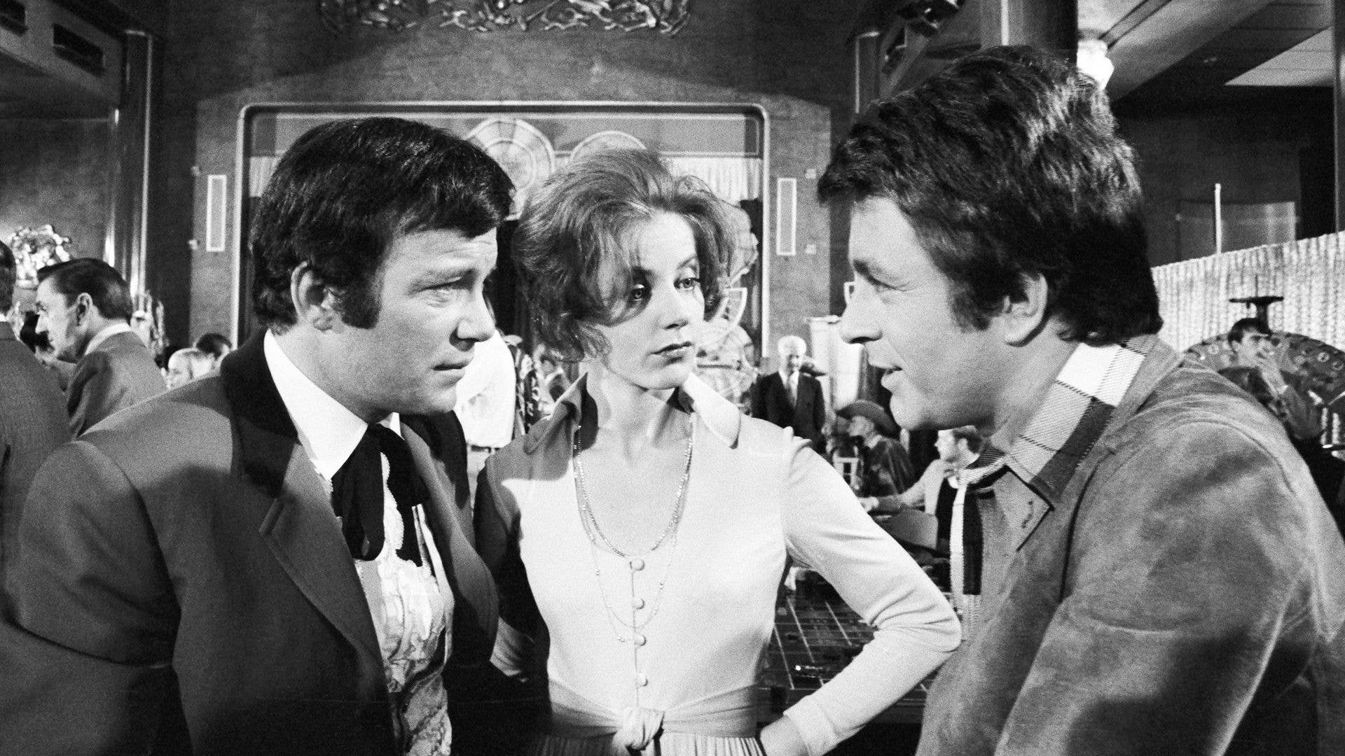 Black-and-white still of William Shatner, Katherine Justice and Bill Bixby in The Magician