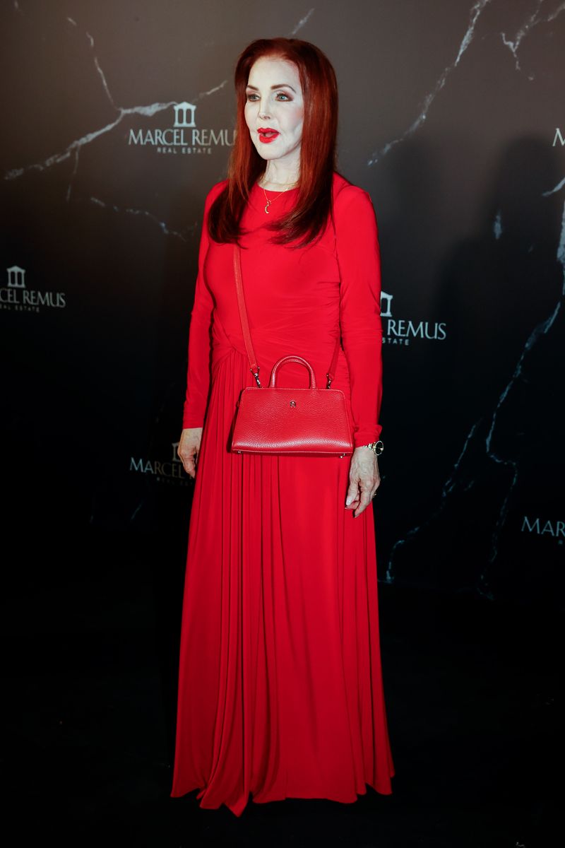 Priscilla Presley turns heads in vibrant red gown during rare appearance at glamorous Mallorca event