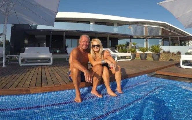 photo of bonnie tyler and robert sullivan sitting by swimming pool