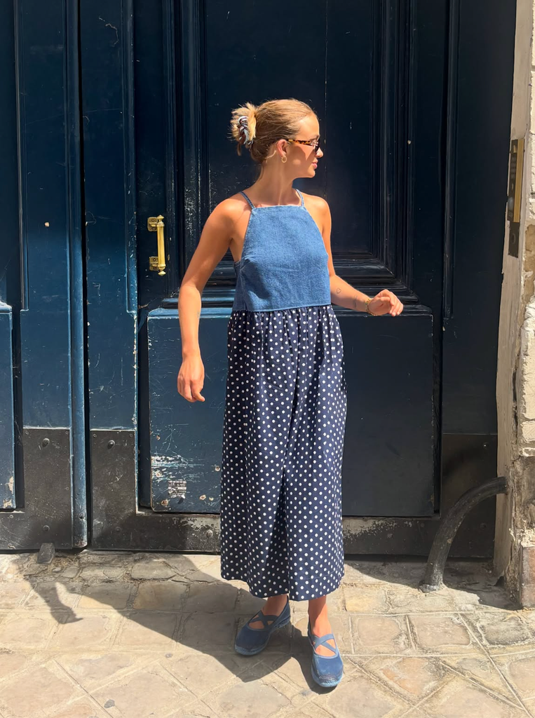 A photo of Lady Amelia Windsor wearing a blue dress 