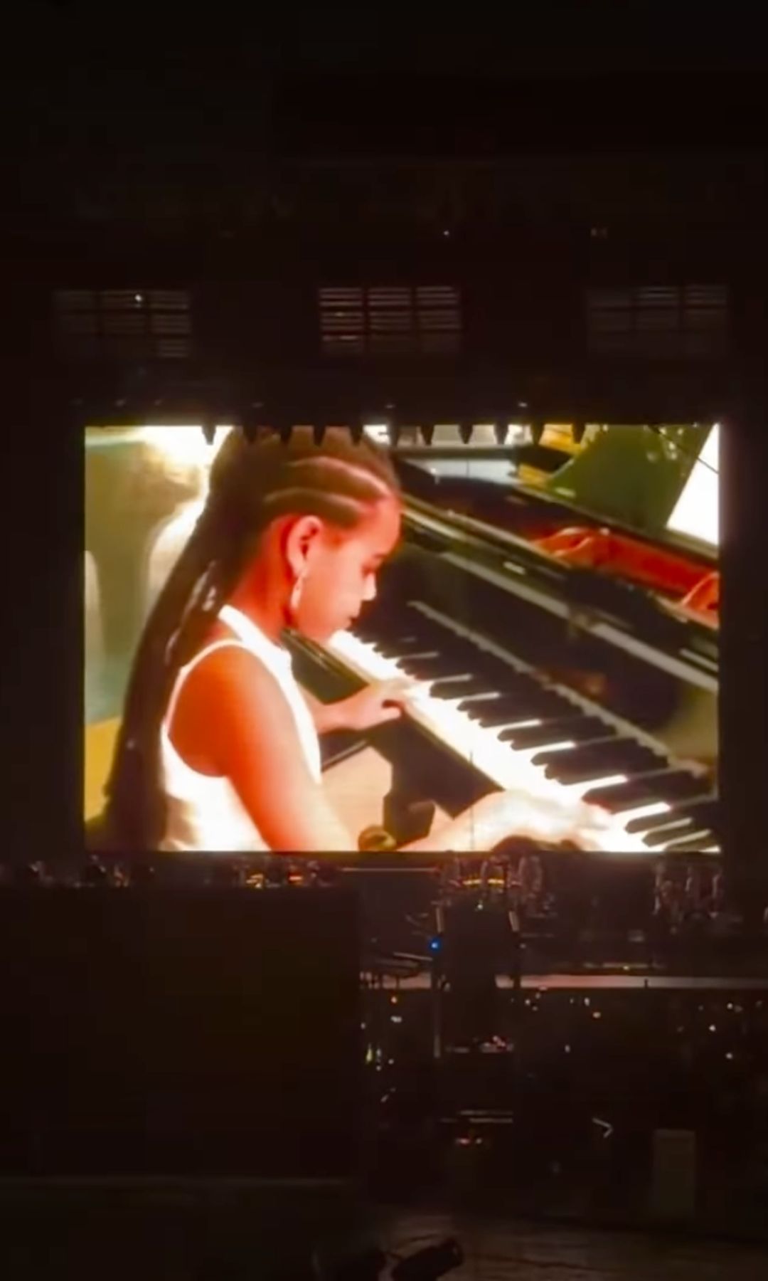 Blue Ivy Carter stole a heartfelt moment at Jay-Z's Yankee Stadium concert by playing piano during "Feelin' It," celebrating family, legacy and musical talent.