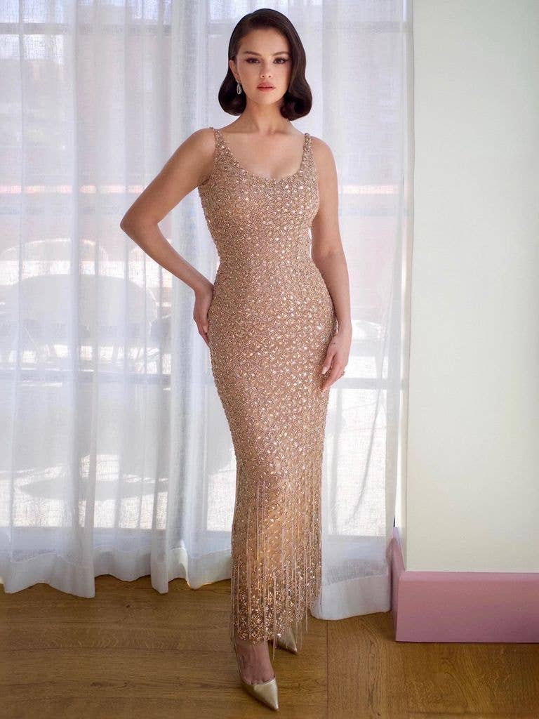 photo of selena gomez in gold dress