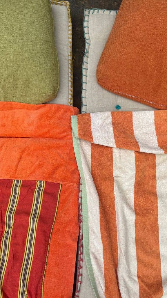 Amelia's fabulous towel matched her tangerine ensemble