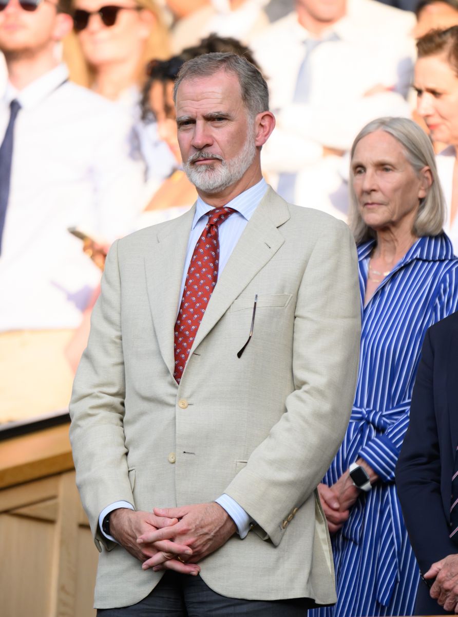 The Spanish monarch favors restrained tailoring that reflects the calm authority of his public role.