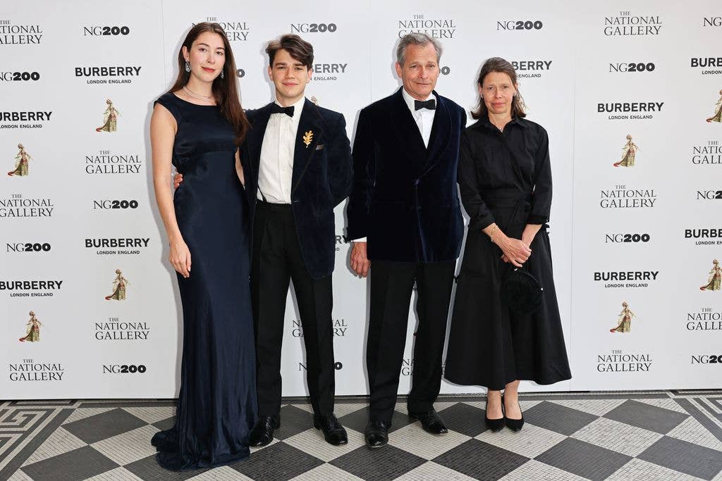 two couples attending summer party