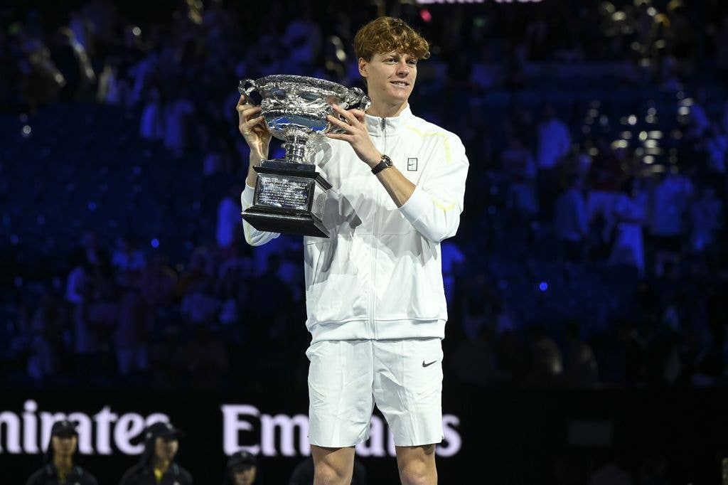 Jannik Sinner of Italy holds the Norman Brookes Challenge Cup after winning the Men's Singles Final at Australian Open