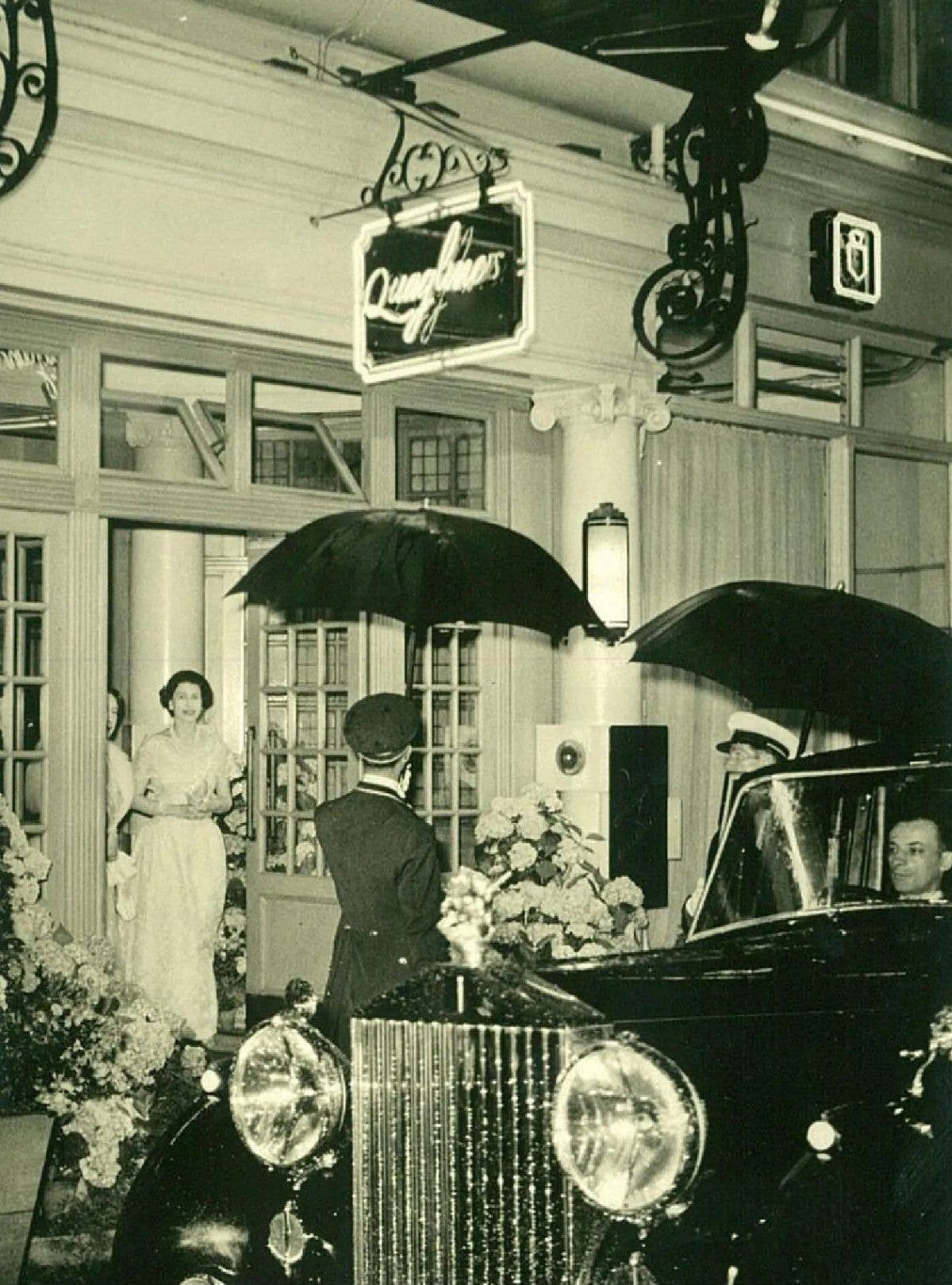 The late Queen pictured leaving Quaglino's