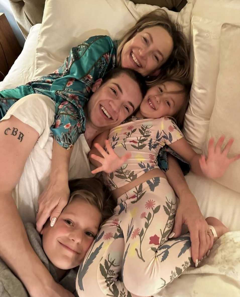 Kate Hudson embraces her blended family with pride. 