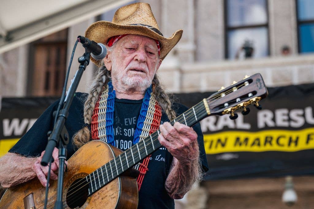 Willie Nelson performs during the Georgetown to Austin March for Democracy rally on July 31, 2021 in Austin, Texas