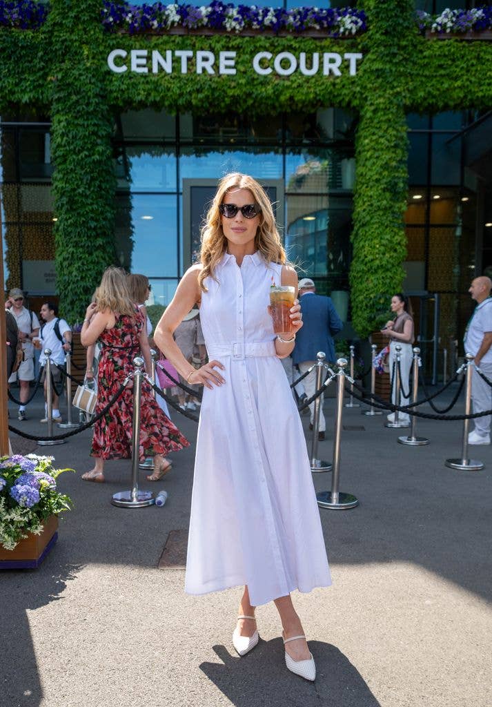 Lady Amelia Spencer posed with a Pimm's in between matches