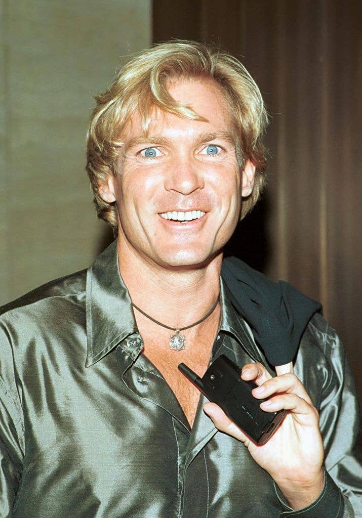 (Original Caption) Sam Champion.