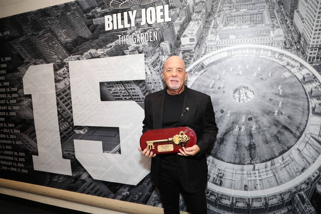 Billy Joel is presented with the Key to the City of New York backstage before the last show of his residency at Madison Square Garden on July 25, 2024 in New York City