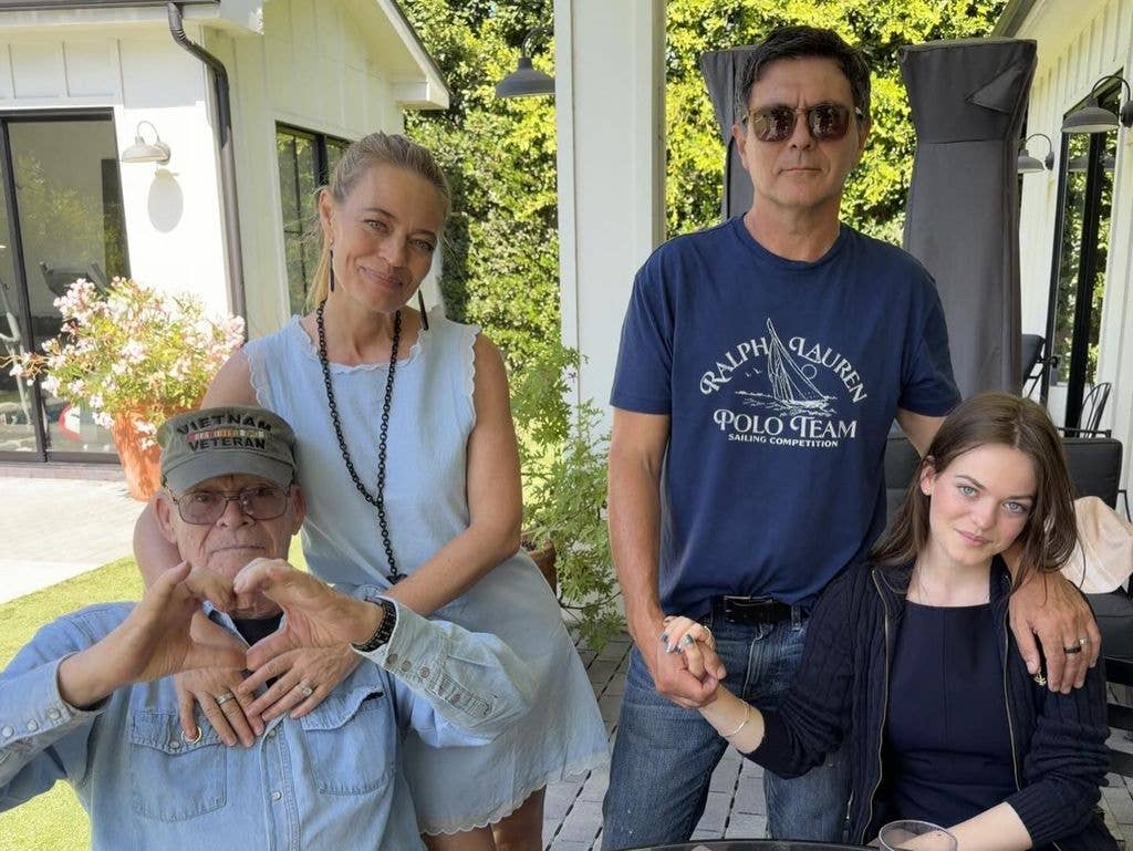 Jeri Ryan (2L) with her dad (L), husband Christoph and daughter Gisele