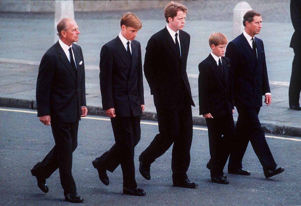 The Duke of Edinburgh, Prince William, Earl Spencer, Prince Harry and the Prince of Wales follow the coffin of Diana, Princess of Wales in September 1997. 