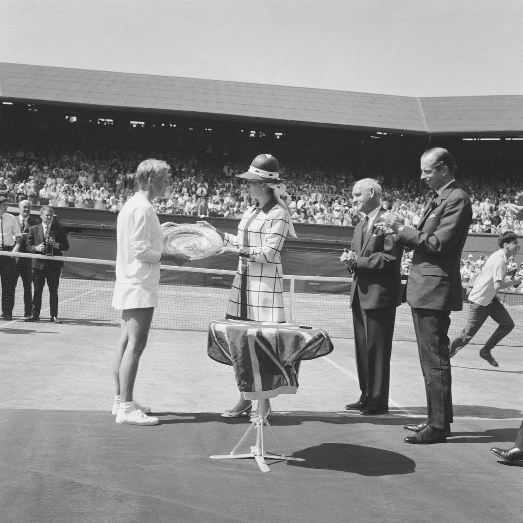 A photo of Princess Anne being presenting the Wimbledon trophy