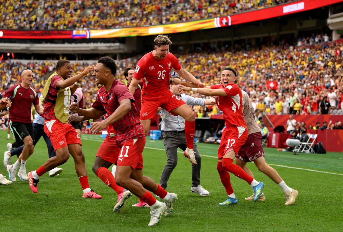 Switzerland celebrates reaching the World Cup quarterfinals, where it will face defending champion Argentina.