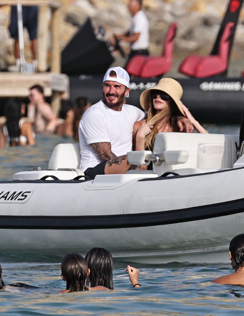 David Beckham and Victoria Beckham enjoy a boat ride after lunch with friends in Ibiza.