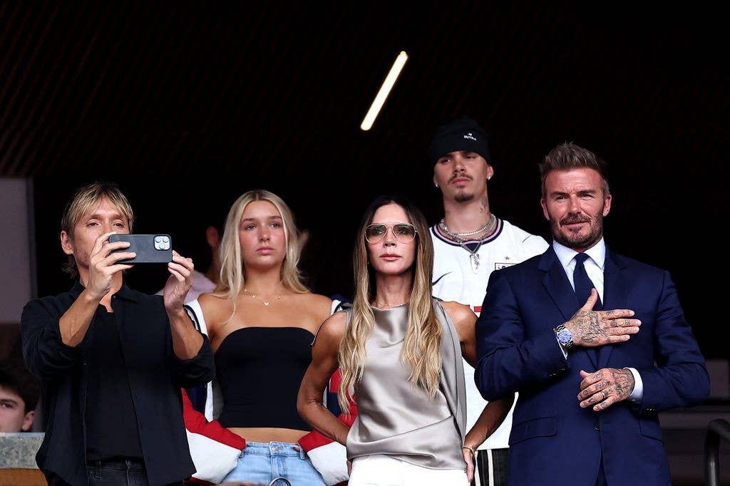 Harper watching the match between Norway and England with her family