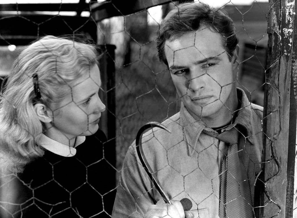 1954: Actor Marlon Brando and Eva Marie Saint on the set of the movie 'On the Waterfront' which came out in 1954. (Photo by 20th Century-Fox/Getty Images)