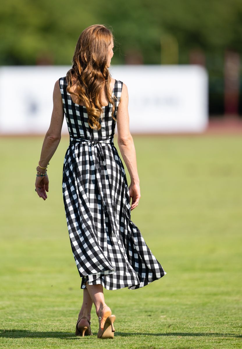 The elegant midi dress balanced effortless comfort with refined tailoring, making it an ideal choice for a summer polo match.