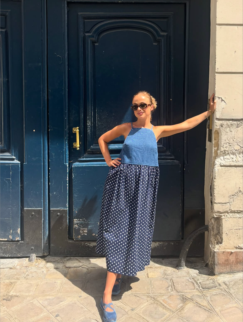A photo of Lady Amelia Windsor wearing a blue dress