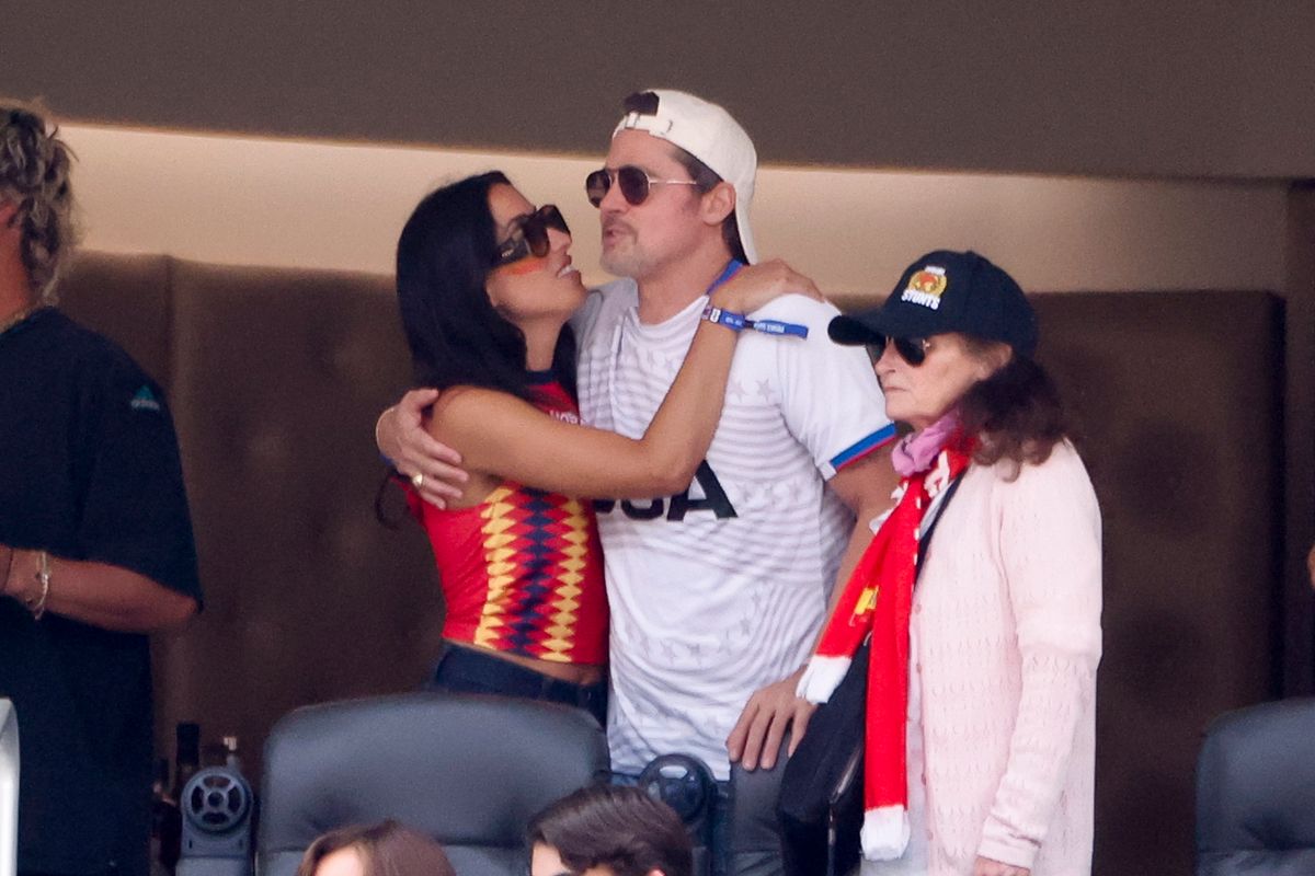 The couple looked happy and like they were enjoying the match