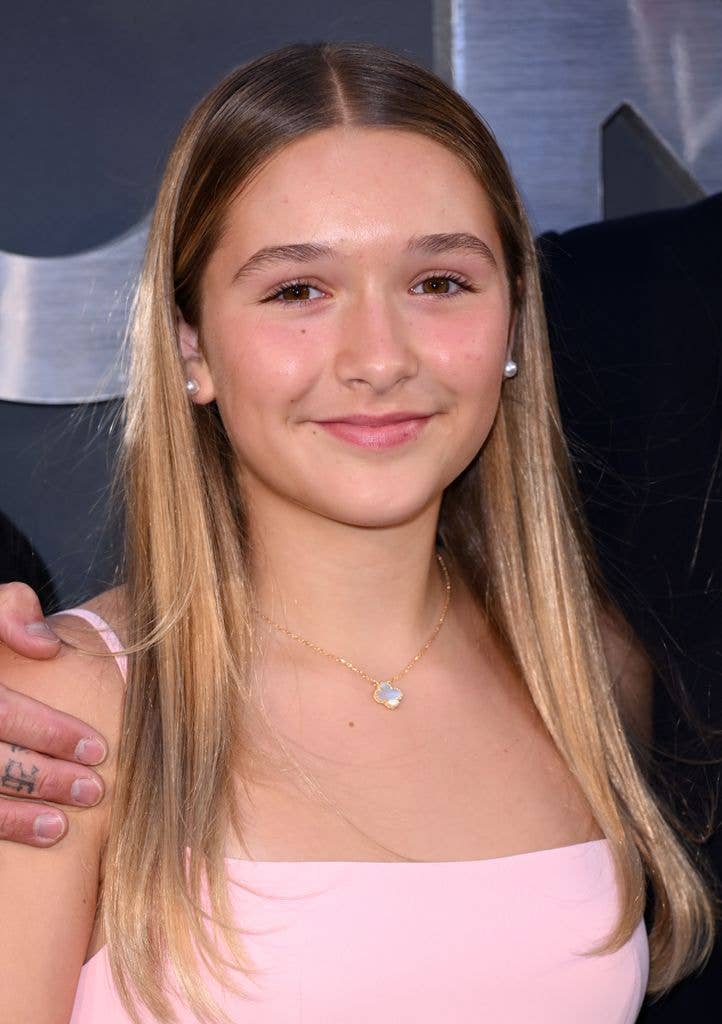 The 14-year-old looked all grown-up with freshly bleached blonde hair and extra-long white nail extensions