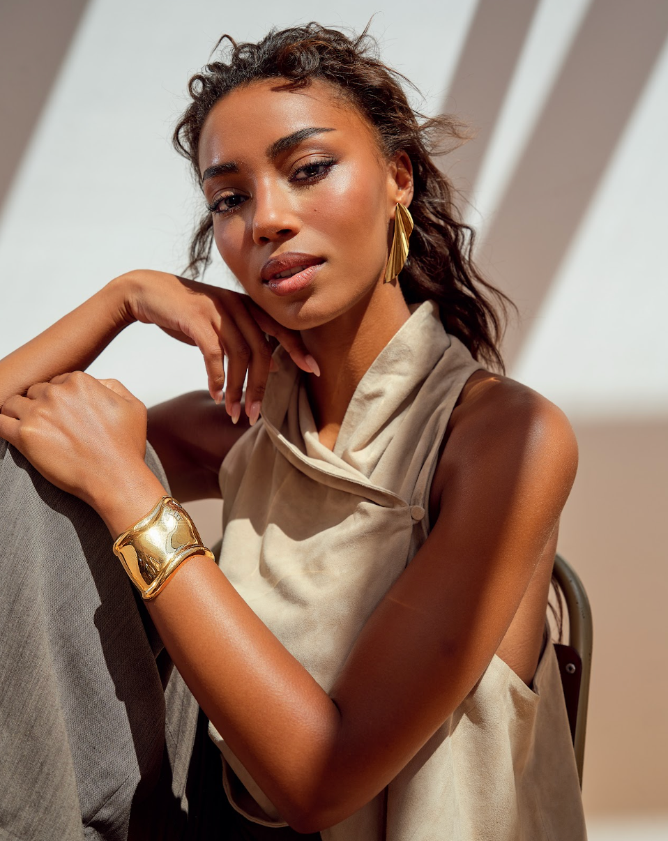 Top, £1,600, Trousers, £600, both, Giorgio Armani, Earrings, £4,725, Bracelet, POA, both Tiffany & Co