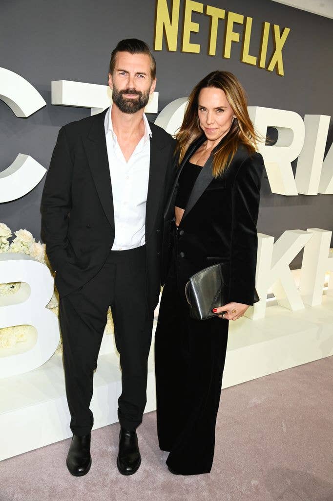 Scott Dingwall and Mel C standing together at a Netflix event, both dressed in black.