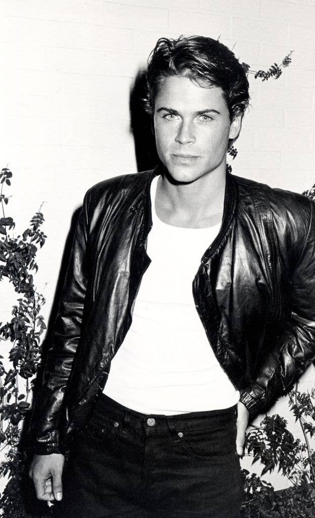 Black and white photograph of Rob Lowe in 1983.