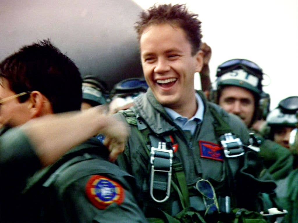 The movie "Top Gun", directed by Tony Scott. Seen here, Tim Robbins as Lt. Sam "Merlin" Wells. Initial theatrical release May 16, 1986. Screen capture. Paramount Pictures.