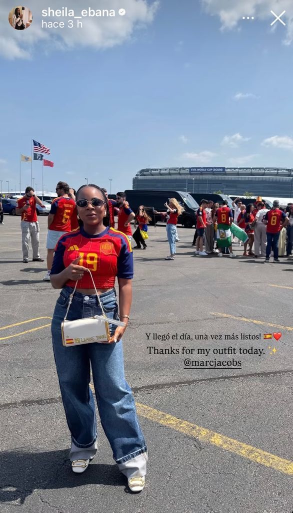 Sheila Ebana outside the New York New Jersey Stadium with a personalized bag in honor of her son.