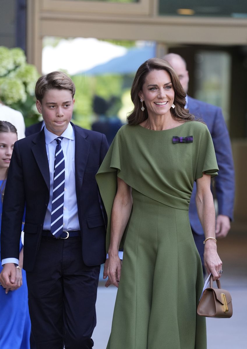 Kate finished her Wimbledon ensemble with a compact brown DeMellier handbag, adding a subtle touch of contrast to her elegant green dress while showcasing one of her favorite British accessories brands.