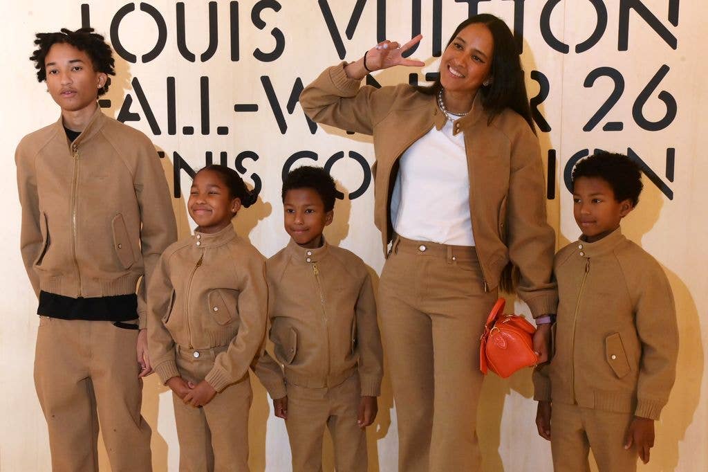 Pharrell Williams' wife Helen Lasichanh (2R) and their children attend the Louis Vuitton Menswear Fall/Winter 2026/2027 show as part of Paris Fashion Week on January 20, 2026 in Paris, France.