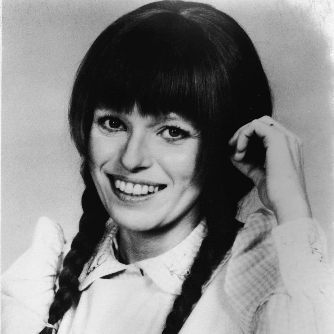 Portrait of American actress Louise Lasser, smiling with her hair in pigtails, as the titular character on the short-lived nighttime serial 'Mary Hartman, Mary Hartman,' 1976.