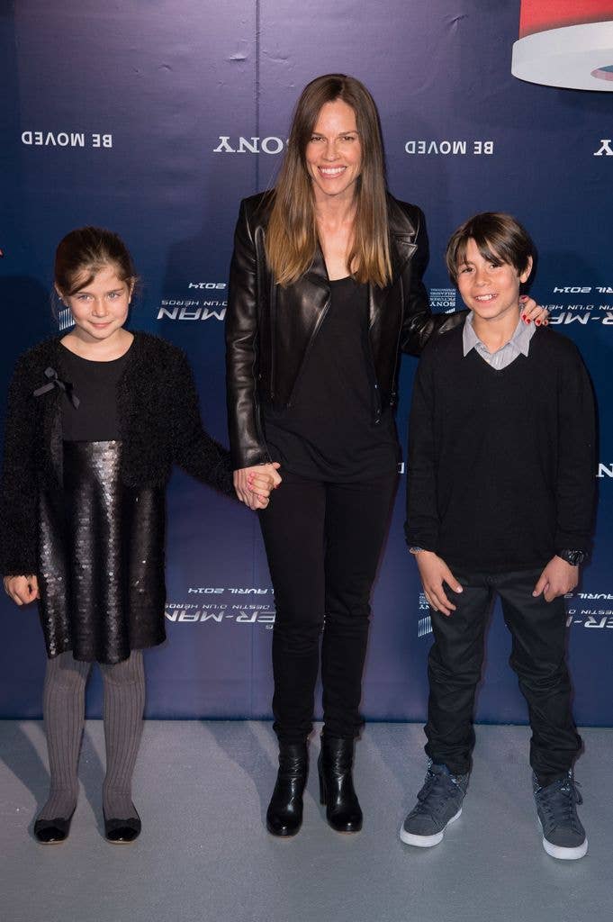 Hilary Swank (C) poses with children Margaux (L) and Timoty (R) during 'The Amazing Spider-Man 2' Paris Premiere at Le Grand Rex, in Paris.