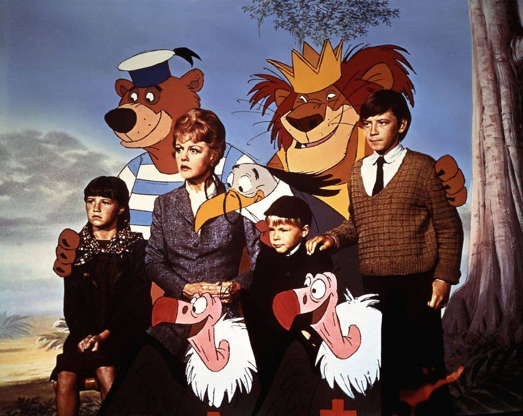 Cindy O'Callaghan, Angela Lansbury, Roy Snart and Ian Weighill surrounded by animated animals