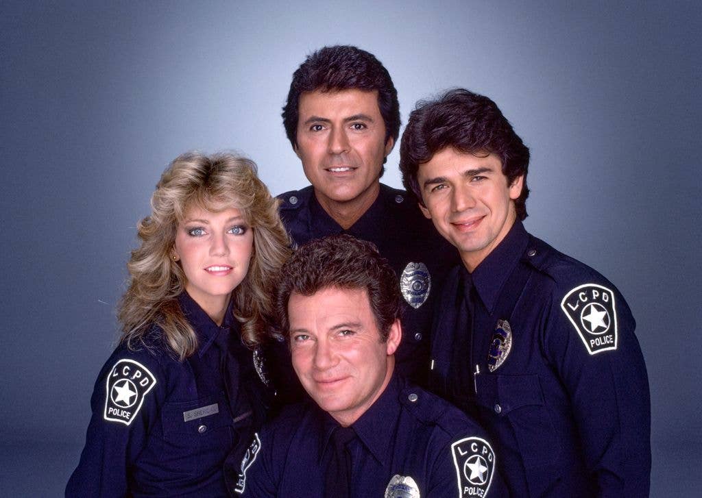 Pictured from left is Heather Locklear (as Officer Stacy Sheridan), James Darren (as Officer Jim Corrigan), Adrian Zmed (as Officer Vince Romano) and in front is William Shatner (as Sergeant T.J. Hooker) in the CBS television show, T.J. HOOKER. September 1, 1985.